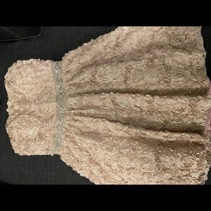 Mauve dress with rosettes